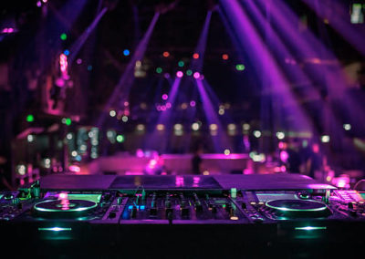 DJ console mixing desk at a night club